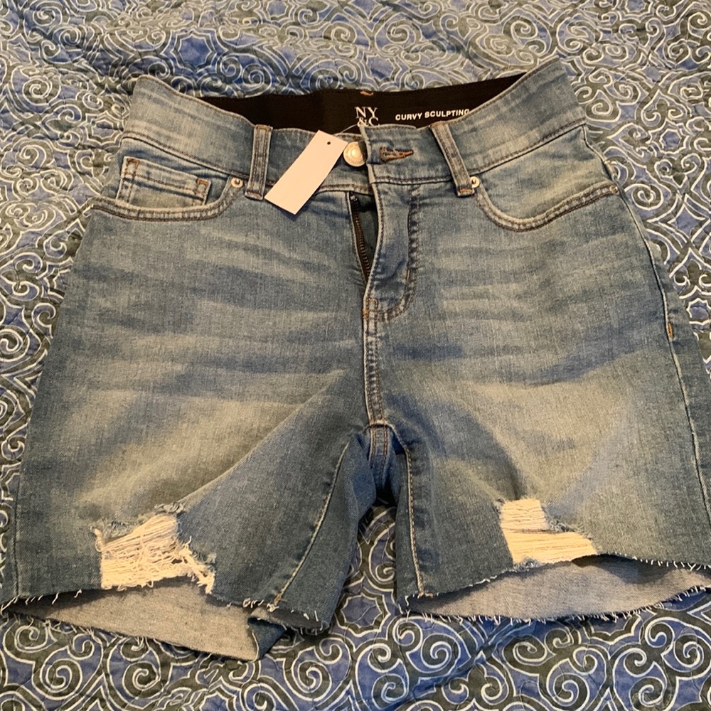 Lightly distressed denim shorts